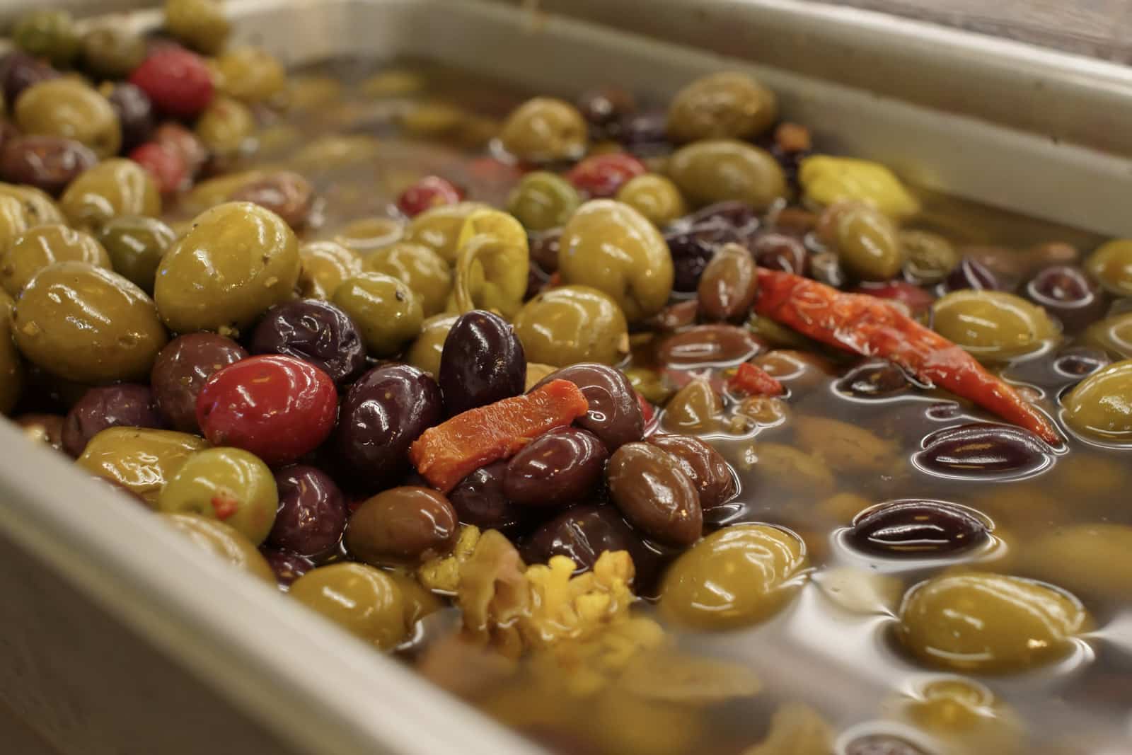 assortment of olives and peppers